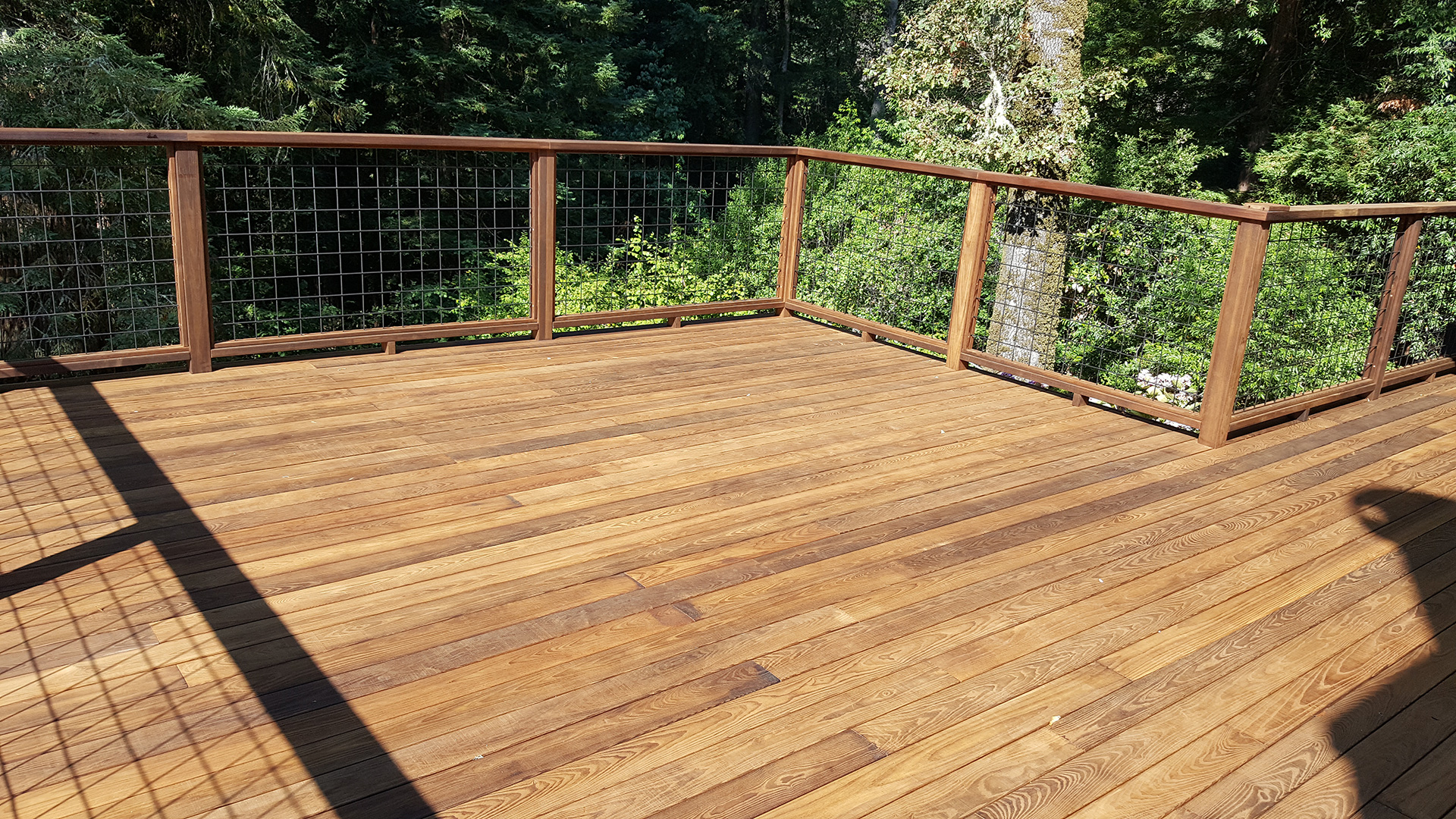 Thermally Modified Wood Ash Deck in Occidental with Wild Hog Wire Rail