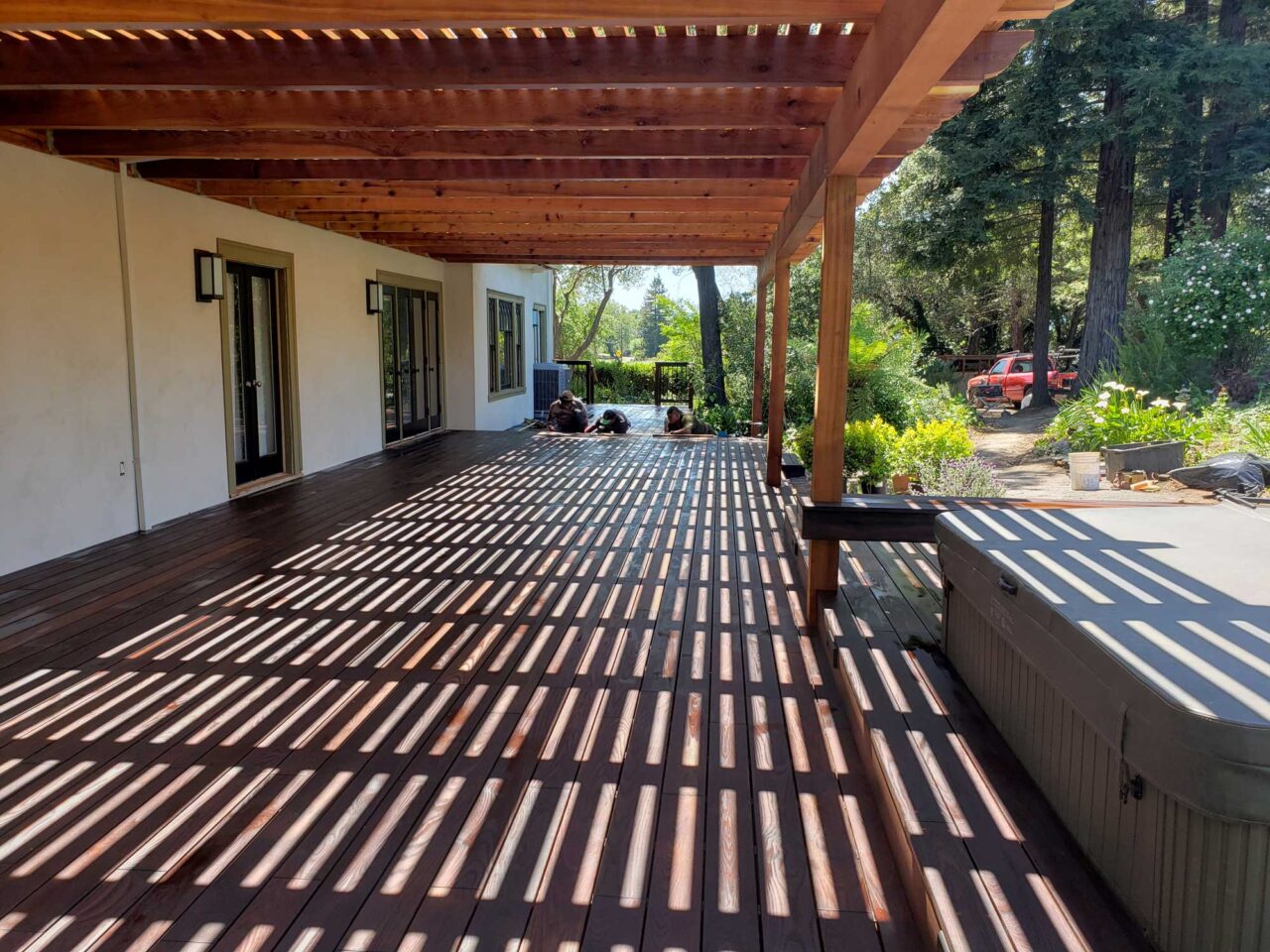 Thermally modified oak deck with cedar patio cover