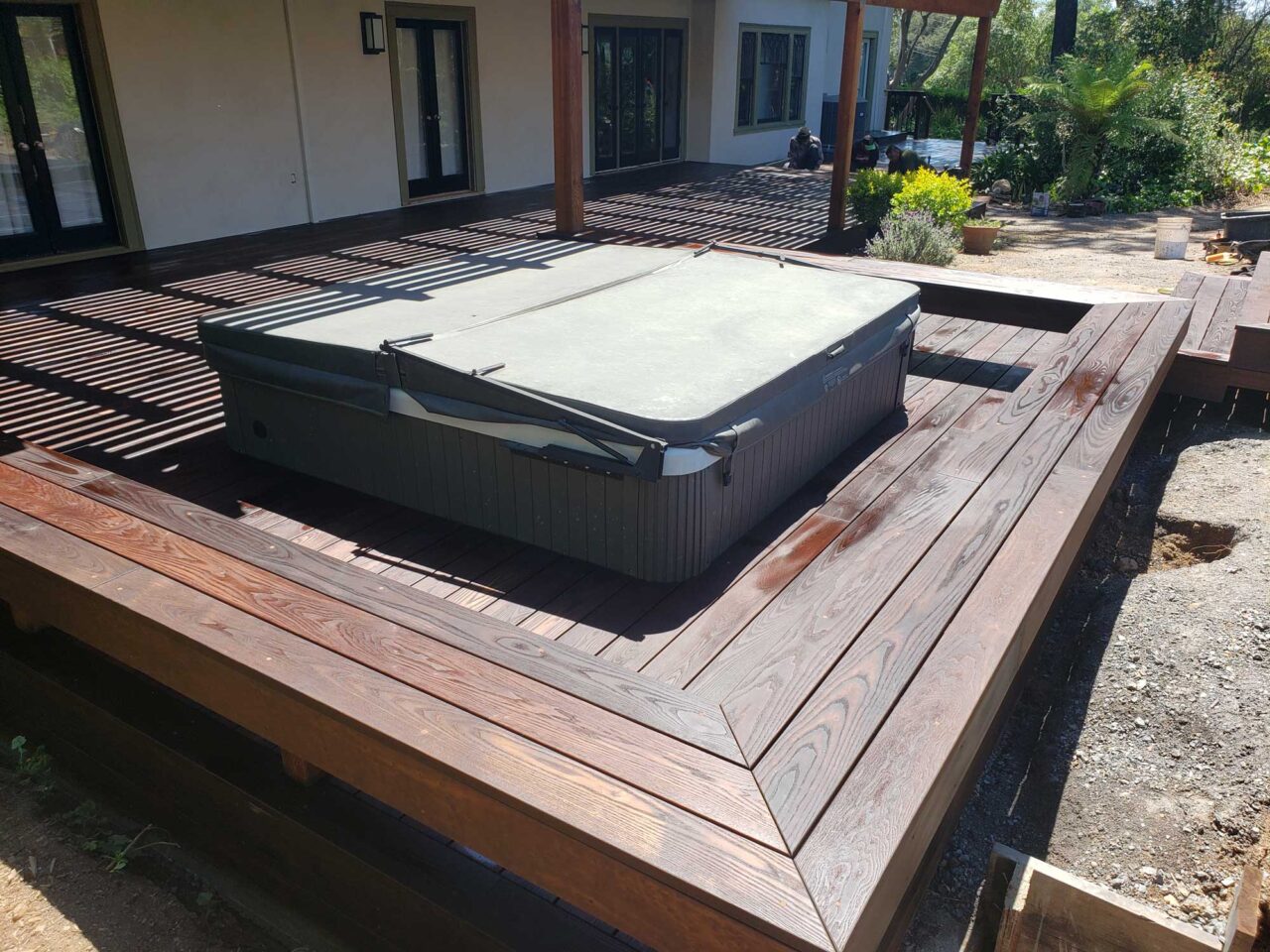 Thermally modified oak deck with cedar patio cover